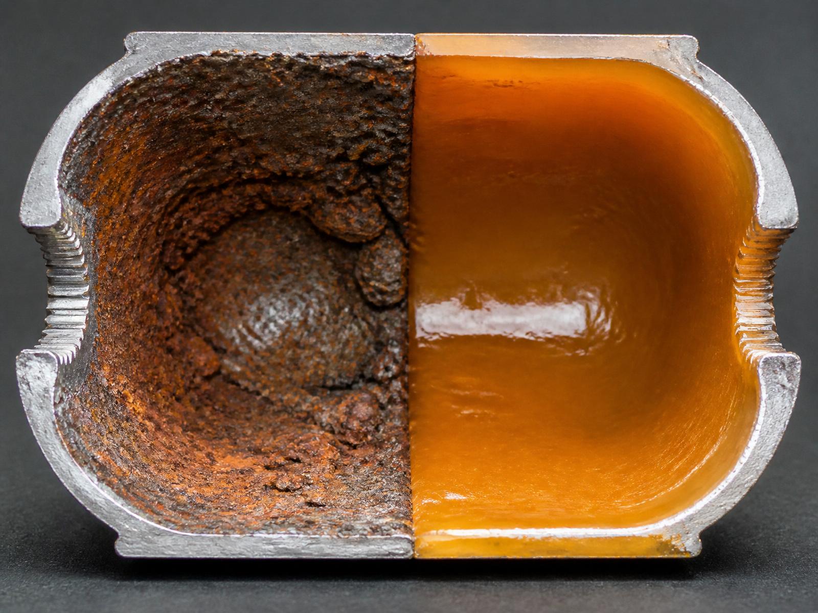 Cutaway view of pipe interior: corroded before and smooth epoxy-coated after