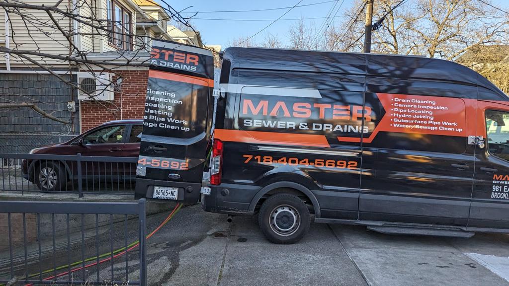 Master Sewer & Drains branded service van